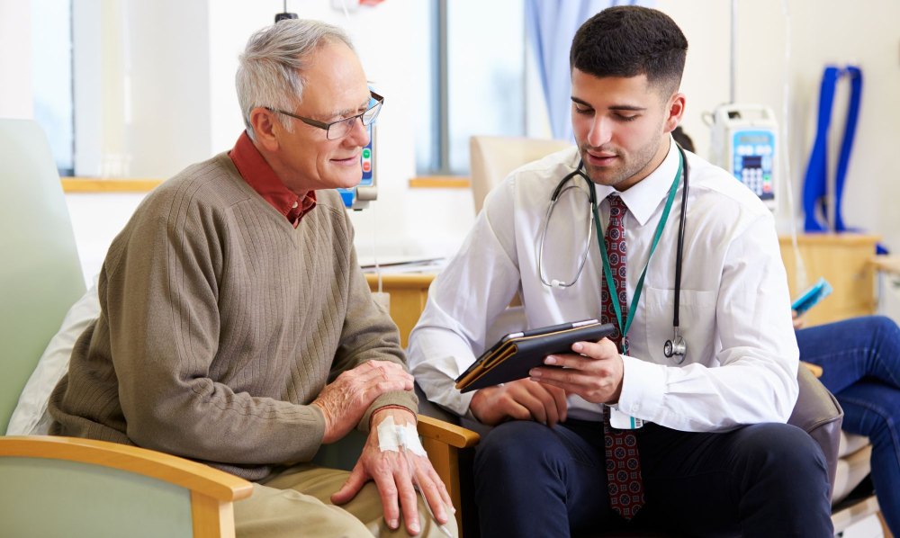 Older adult talking with doctor about medical marijuana card